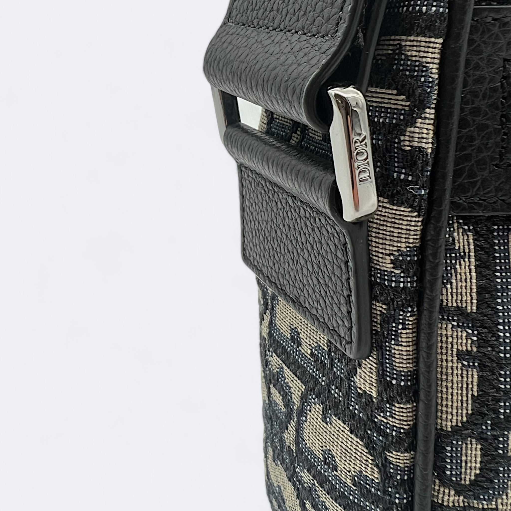 DIOR | #DIORESSENTIALS Clutch with shoulder strap