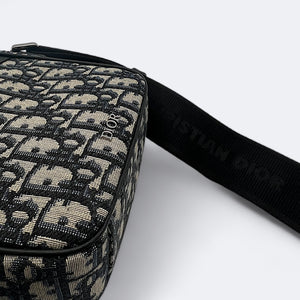 DIOR | #DIORESSENTIALS Clutch with shoulder strap